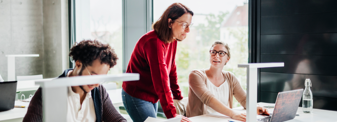 Instructor helping students