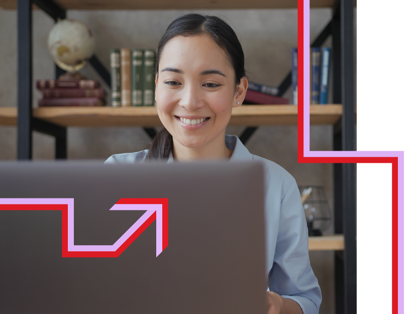 Female instructor working on the laptop with red and light violet McGraw Hill Brand elements Female instructor working on the laptop with red and light violet McGraw Hill Brand elements